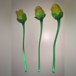 Three glass yellow roses.  Each 13” long.